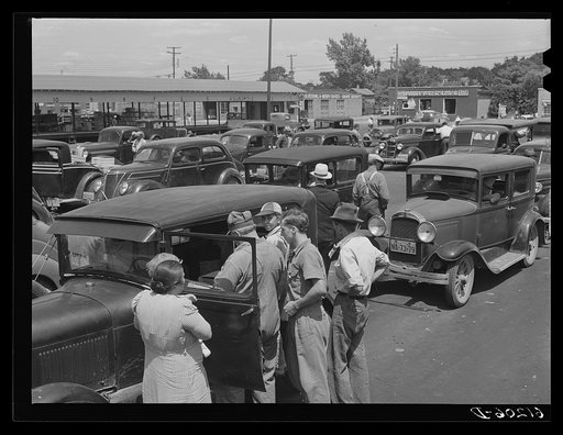 Inspecting crates of cherries at fruit market. Benton Harbor, Michigan