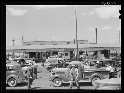 Activity at fruit and produce market. Benton Harbor, Michigan
