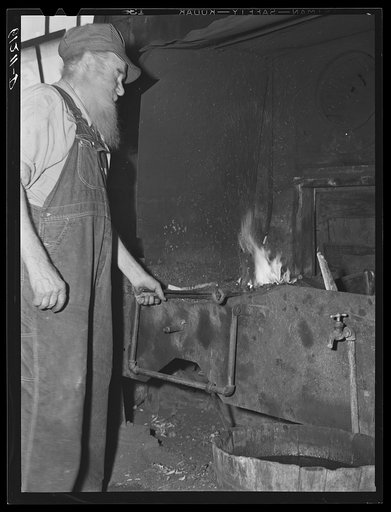 Blacksmith at the House of David religious community. Benton Harbor, Michigan