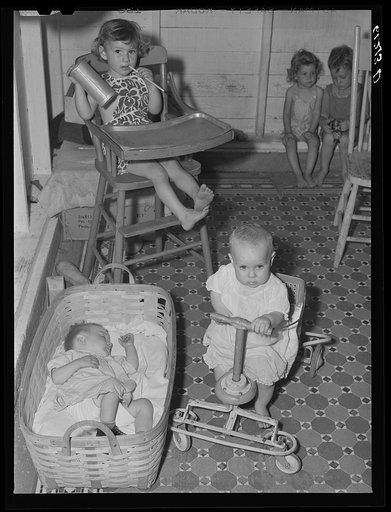 Untitled photo, possibly related to: Young children are taken to nursery school operated by Women's Council for Home Missions while parents are picking fruit. Berrien County, Michigan