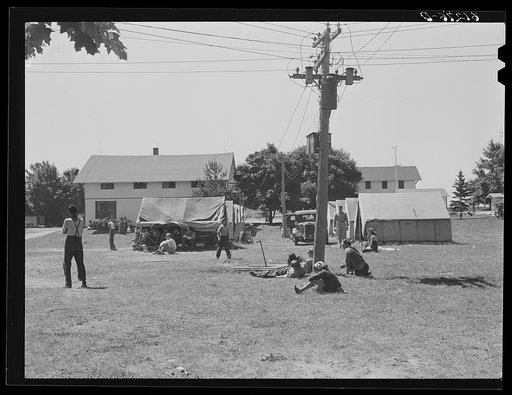 Cherry pickers camp. They sleep in tents and in the dormitories in the background. The pickers are mostly youths, sixteen to twenty-four, who come from nearby cities and states for about a three-week picking season. Door County, Wisconsin