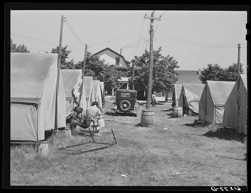 Tents for cherry pickers on property of large grower. Door County, Wisconsin