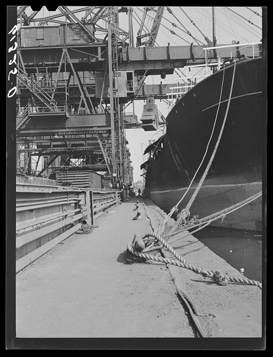 Foreign ship unloading iron ore at Bethlehem steel mill. Sparrows Point, Maryland