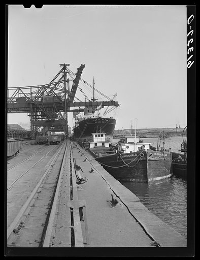 Unloading iron ore at Bethlehem steel mill. Sparrows Point, Maryland