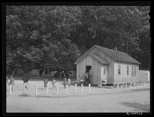 Children coming out of school at noon. School near Scotland, Maryland. Saint Mary's County, Maryland
