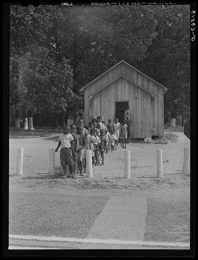 Children coming out of school at noon. Saint Mary's County, Maryland