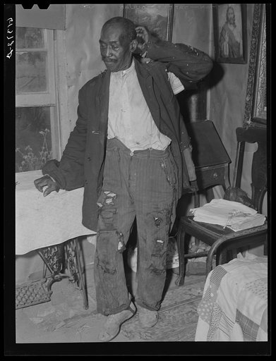 Untitled photo, possibly related to: John Dyson, FSA (Farm Security Administration) borrower, playing the accordion. He was born into slavery over eighty years ago. Saint Mary's County, Maryland