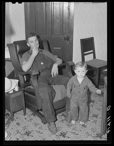 Untitled photo, possibly related to: Owner of 120-acre farm with family. Meeker County, Minnesota