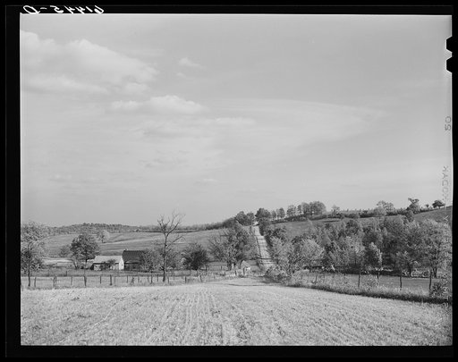 At the foot of the hilly farm section of Ross County, Ohio. Town of Chillicothe in background