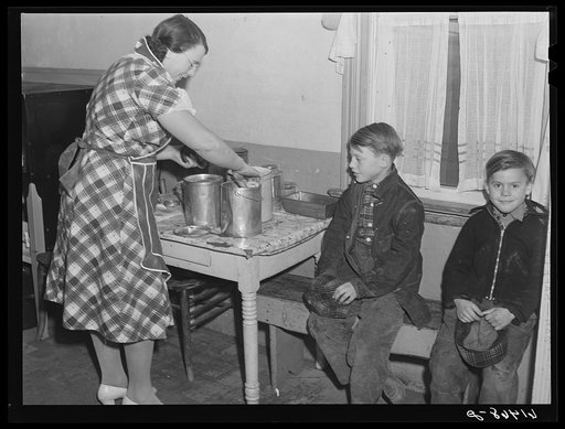 Mrs. Sauer packing lunches for children before school. Cavalier County, North Dakota