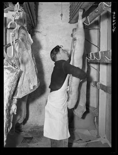 Meats are hung in chilling room when first brought in, then cut into roasts, etc., and frozen. Cold storage lockers, Casselton, North Dakota