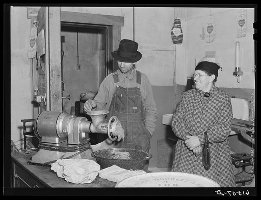 Grinding meat at co-op cold storage lockers. Castleton, North Dakota