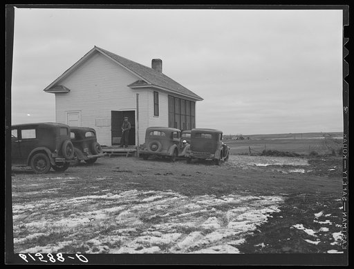 Schoolhouse where farmers are voting, election day, 1940. Beaver Creek precinct, McIntosh County, North Dakota