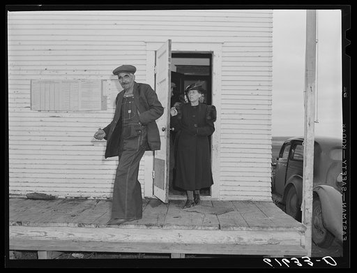 Coming out of schoolhouse after voting. November election, 1940. McIntosh County, North Dakota