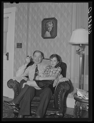 L.M. Schulstad, traveling salesman for hardware company, with his daughter. Aberdeen, South Dakota