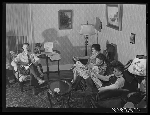 L.M. Schulstad, traveling salesman for hardware company, at home with his family. Aberdeen, South Dakota