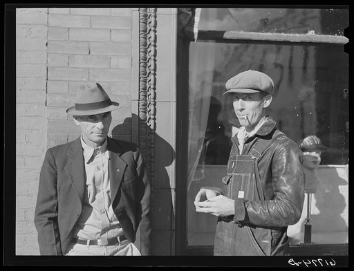 Men on the street. Chanute, Kansas