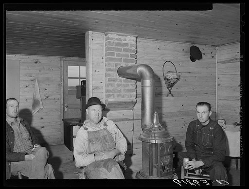 Agricutural day laborers, father and son, now occupying one of the scattered labor homes built by FSA (Farm Security Administration) at New Madrid County, Missouri
