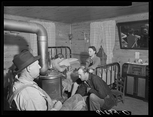 Family of agricultural day laborer in one of the scattered labor homes built by FSA (Farm Security Administration). New Madrid County, Missouri