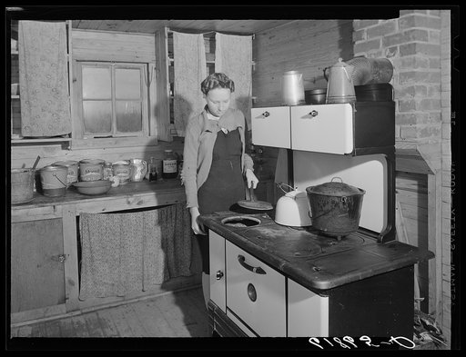 Kitchen in one of the scattered labor homes built by FSA (Farm Security Administration) at a cost of five hundred dollars. New Madrid County, Missouri