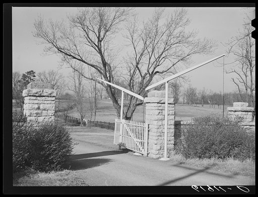 Entrance to large estate and horse farm in Bluegrass country. Fayette County, Kentucky