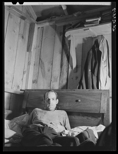 W.W. McDaniel, rigger at Hercules powder plant, in his bunkhouse in the rear of Mrs. Pritchard's boardinghouse. Radford, Virginia
