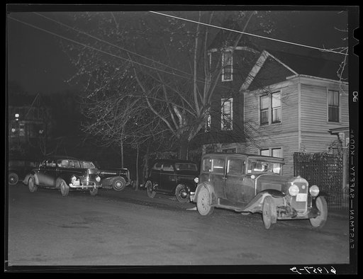 Untitled photo, possibly related to: Crowded boardinghouse with cars parked outside. Radford, Virginia