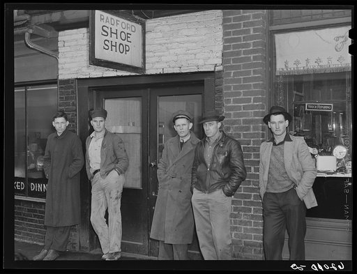 Men on the street in Radford, Virginia, just before change of shift