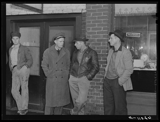 Untitled photo, possibly related to: Men on the street in Radford, Virginia, just before change of shift