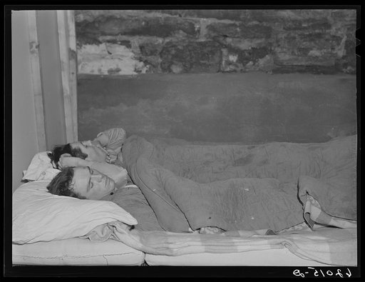 Untitled photo, possibly related to: Two boys employed at powder plant sleeping in basement of Mr. Tilly's furniture store. Radford, Virginia