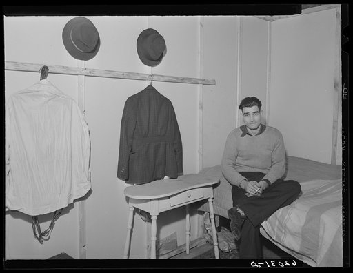 Mechanic at powder plant in his room in basement of Mr. Tilly's furniture store. Radford, Virginia