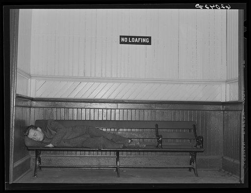 Boy from out of town sleeping in railroad station. Radford, Virginia