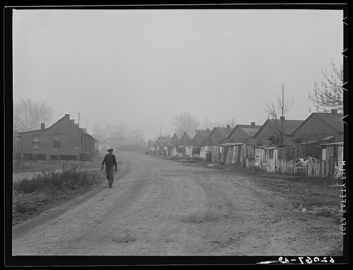 Negro housing in North Memphis, Tennessee. Some of the occupants of these houses work at powder plant in Millington. Rent of twelve dollars a month was recently raised to fourteen dollars