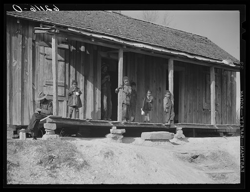 Untitled photo, possibly related to: Front porch of sharecropper home. Etowah County, Alabama