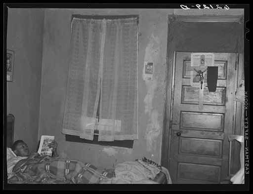 Steelworker who works on night shift in bed during day. Aliquippa, Pennsylvania