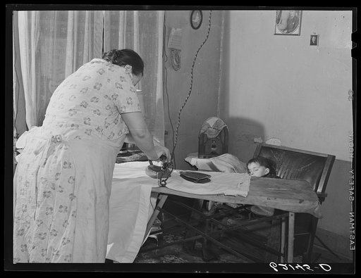 Steelworker's wife ironing. Ambridge, Pennsylvania