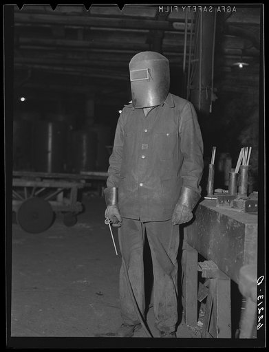 Electric welder in structural shop of Keystone Drilling Company. Beaver Falls, Pennsylvania
