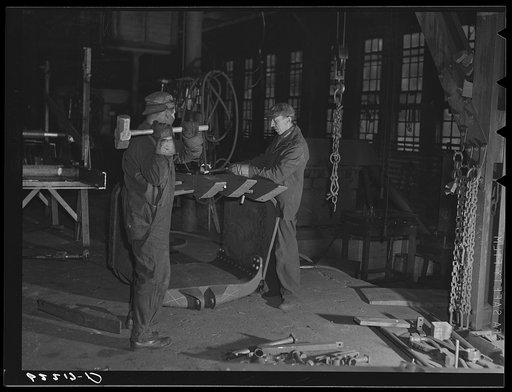 Assembling excavator scoop. Keystone Drilling Company, Beaver Falls, Pennsylvania