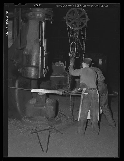 Using 2000 pound steam hammer on jar rein for drilling equipment. Keystone Drilling Company, Beaver Falls, Pennsylvania