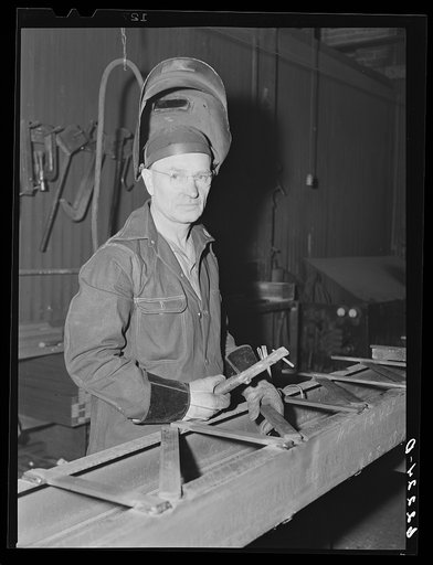 Untitled photo, possibly related to: Electric welder in structural shop of Keystone Drilling Company. Beaver Falls, Pennsylvania