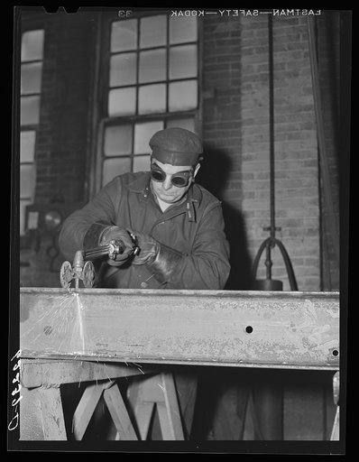 Acetelyne torch cutting. Structural shop, Keystone Drilling Company. Beaver Falls, Pennsylvania