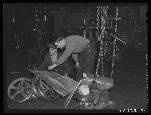 Checking materials against blueprint. Keystone Drilling Company, Beaver Falls, Pennsylvania