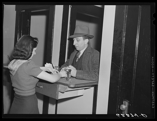 Steelworker paying dues at steelworkers organizing committee office. Ambridge, Pennsylvania