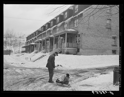Steelworker returning from grocery store. Aliquippa, Pennsylvania