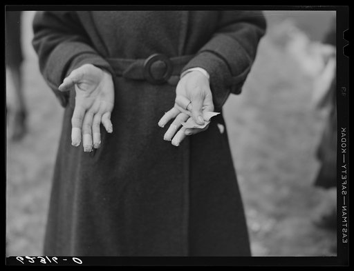 Girl employed at National Electric Products Company, Ambridge, Pennsylvania. Tape on fingers protects them from sharp pieces of metal encountered in her work