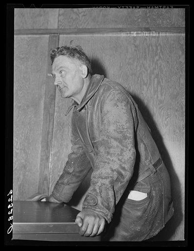 Steelworker at grievance committee meeting. Steelworkers organizing committee office. Aliquippa, Pennsylvania
