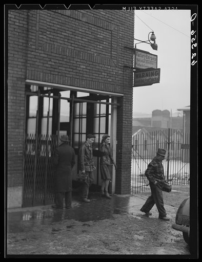 Untitled photo, possibly related to: Quitting time. National Electric Products Comapany. Man on right is company detective. Ambridge, Pennsylvania