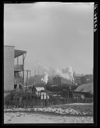 Untitled photo, possibly related to: Backyards of company houses and steel mill. Midland, Pennsylvania