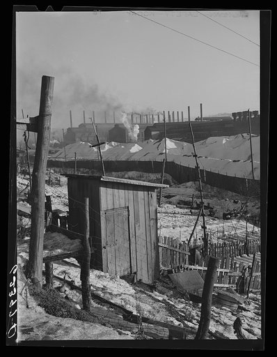 Backyards of company houses and steel mill. Midland, Pennsylvania
