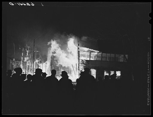 Untitled photo, possibly related to: Farmhouse burning along U.S. Highway No. 113. Near Milford, Delaware